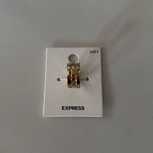 Express gold tone ring. Comfortable in size 6 New